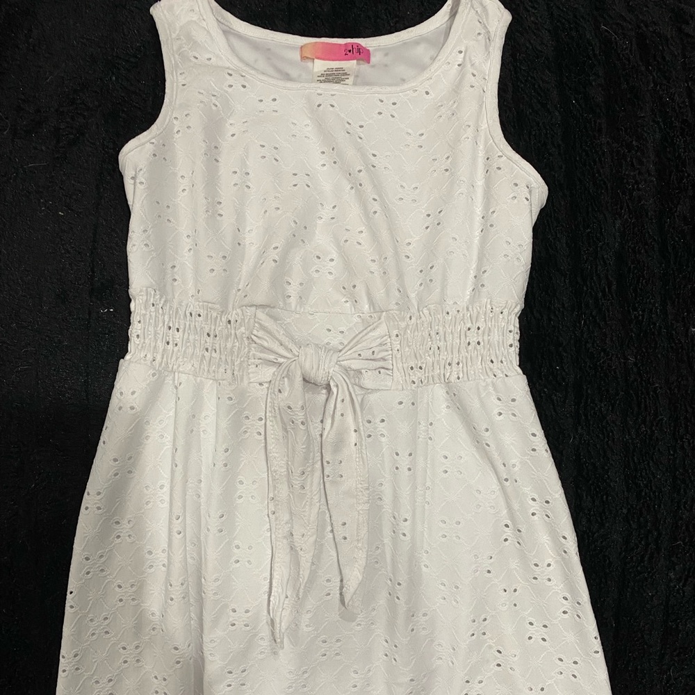 Fully lined white sleeveless summer girl’s dress
